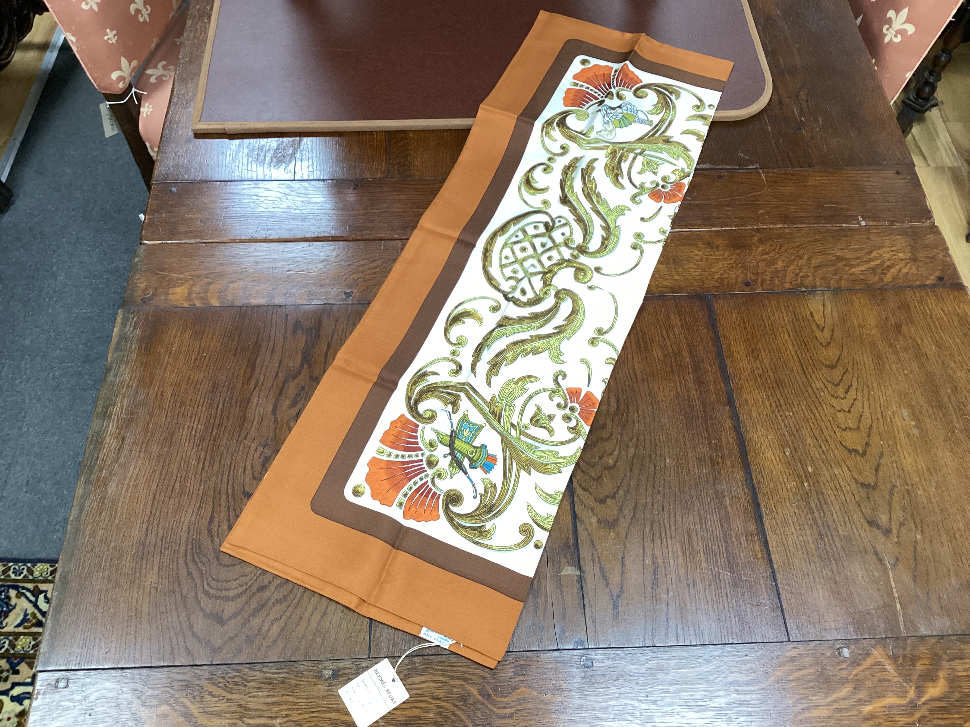 Four vintage Hermes silk scarves comprising Ingrid, Belle Epoque, Passementerie and a rectangular Cheval Turc example retailed by Harrods with label